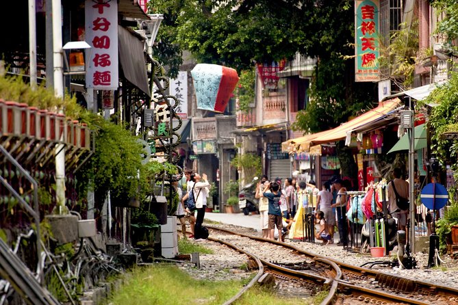 Private Jiufen & Pingxi Day Tour with English-Speaking Guide - Jiufen Old Street is the main event